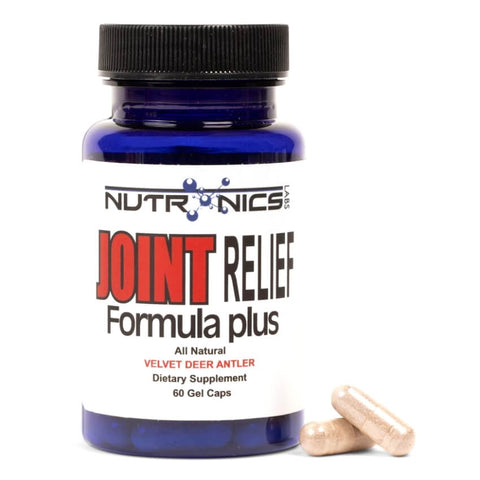 A blue bottle of dietary supplement labeled Nutronics with the text Joint Relief Formula Plus prominently displayed in bold red letters. The label also includes the phrase All Natural Velvet Deer Antler and indicates that the bottle contains 60 gel capsules. Two light-colored capsules are placed beside the bottle on a white background.