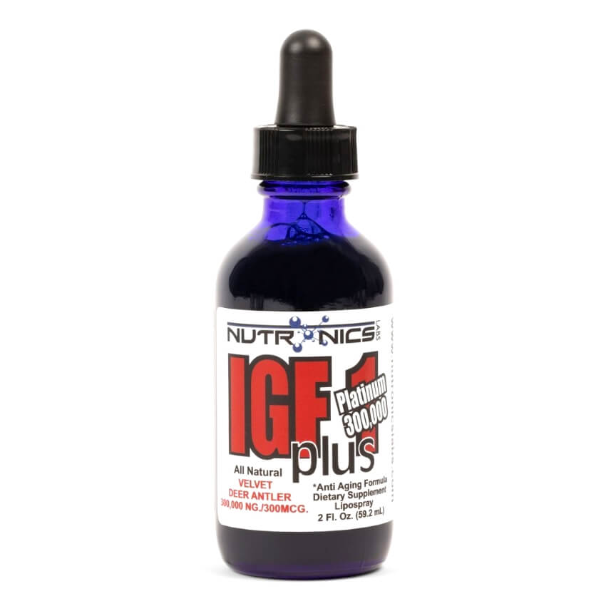 A dark blue glass dropper bottle with a black lid, labeled as IGF1 plus Platinum 300,000. The label features bold red and black text stating "NUTRONICS," "All Natural," "VELVET DEER ANTLER," "300,000 NG/300MCG," and "Anti Aging Formula Dietary Supplement Lipospray." The bottle has a capacity of 2 fluid ounces, or 59.2 milliliters, displayed prominently on the label. The background is plain and uncluttered.