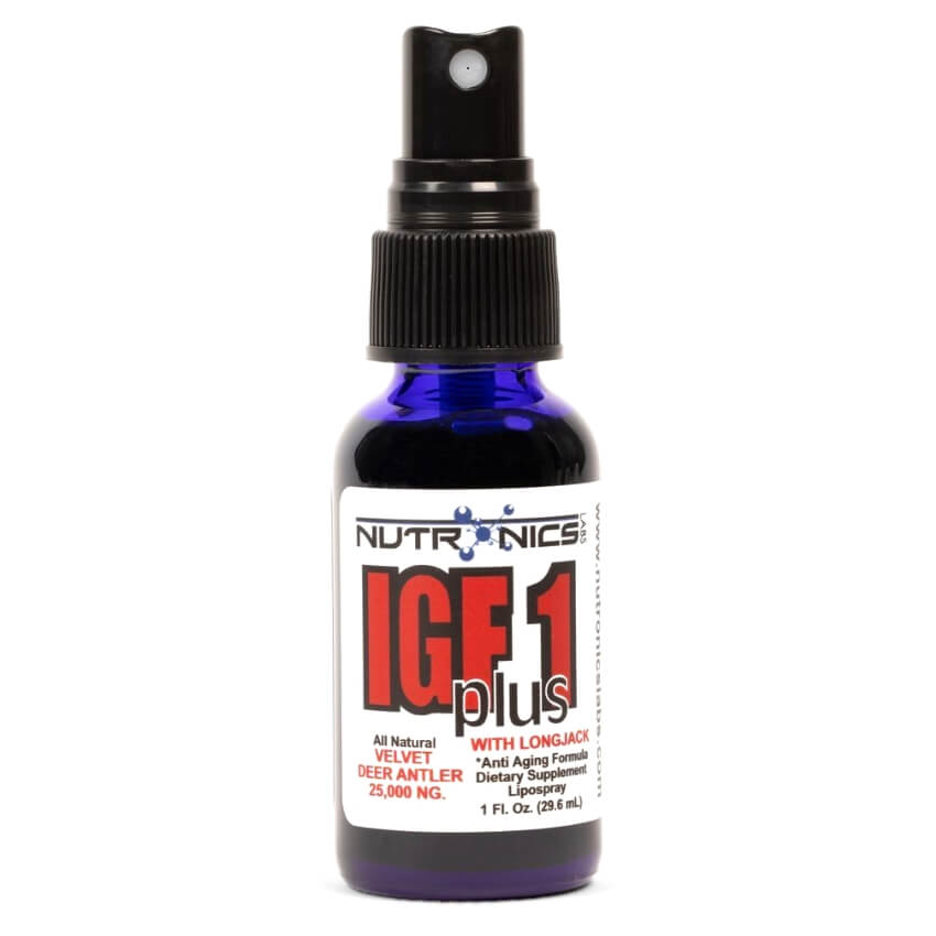 A clear blue glass spray bottle containing a liquid dietary supplement labeled IGF1 plus, with branding from Nutronics. The label features bold red and black text with phrases like "All Natural Velvet Deer Antler" and "With Longjack," along with details about the product’s purpose as an anti-aging formula. The bottle also indicates it contains 25,000 NG of the active ingredient and has a capacity of 1 fluid ounce (29.6 ml). The nozzle for spraying is at the top, with a black plastic cap.