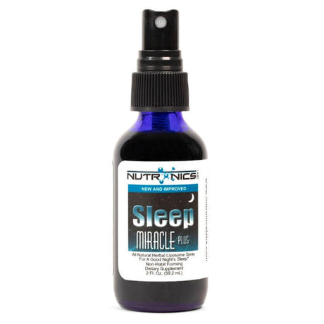 A small, deep blue spray bottle labeled Nutronic's Stress Relief Plus. The bottle has a black spray nozzle at the top and a white label with blue text. The label features a tranquil image of water droplets creating ripples. The bottle contains 1 fluid ounce (29.5 mL) and is described as an all-natural herbal liposome spray.