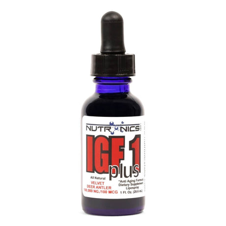 A blue glass dropper bottle labeled IGF 1 plus by Nutronics. The label features bold red and black text, stating "All Natural," "Velvet Deer Antler," and "100,000 NG/100 MCG." The bottle contains 1 fluid ounce, equivalent to 29.5 milliliters. The dropper top is marked with a textured black lid, and the bottle stands upright against a plain white background.